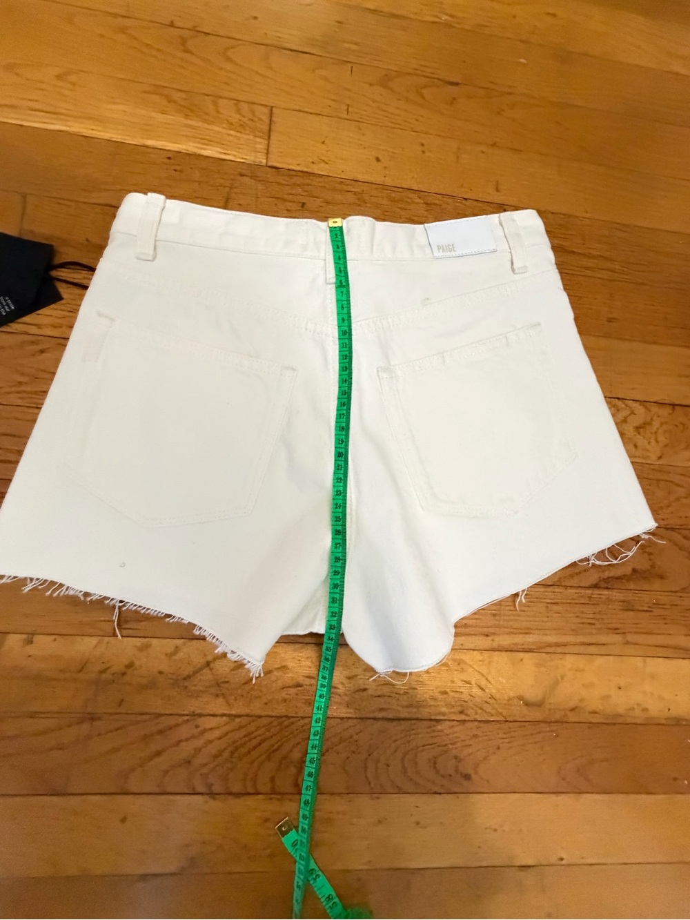 PAIGE White Frayed Hem Denim Cutoff Shorts